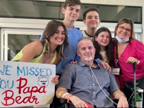 In July, a Miami Beach police officer was hospitalized with COVID-19. He was surprised by family, friends and coworkers when he was finally released Monday.