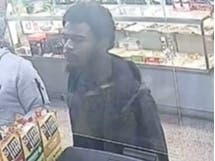 A warrant has been issued for Johnny D. Evans, who is accused of fatally shooting a man outside Moore’s Grocery early Thursday, police said.
