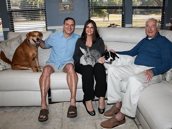 Jim Entwistle, left, suffered third-degree burns on 44 percent of his body in 2020. Now, he’s volunteering with the medical team that saved him.