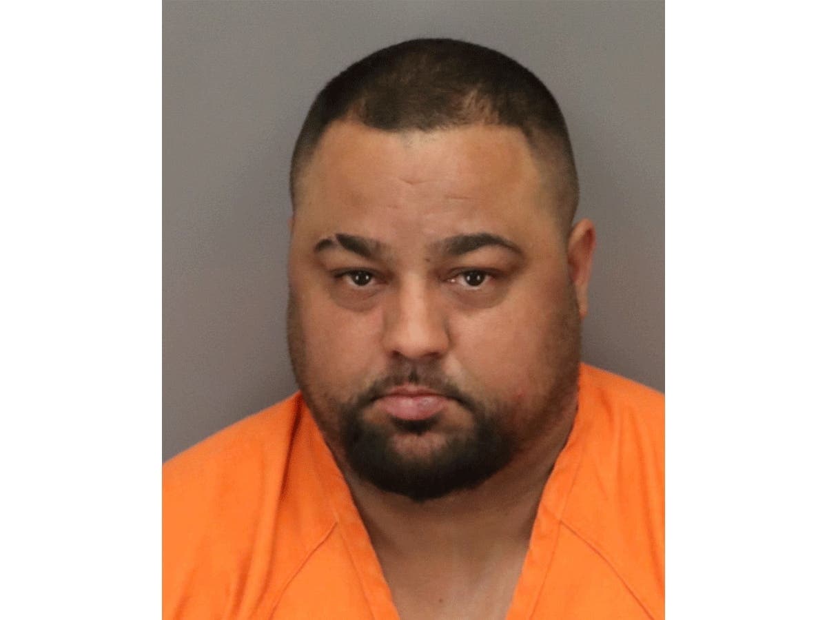 The father of a boy who was killed by a motorcyclist going more than 100 mph was charged with attending an illegal street racing event, child neglect, St. Pete police said.