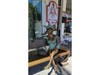 Artist Mike Elwell said that he hopes the city of St. Petersburg might consider purchasing his remaining bronze sculptures that call downtown home. They sit on private property outside Red Cloud Gallery and Kilwins ice cream shop.