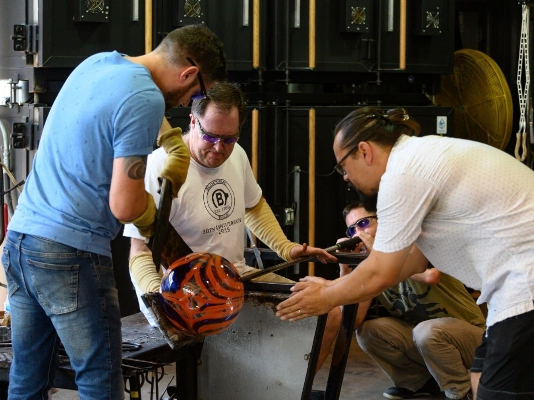 The Morean Arts Center's Operation: Art of Valor program offers glassblowing, ceramics and photography classes to veterans. Pint glasses, glass art by its participants are for sale at St. Pete's Bayboro Brewing on Monday during a Memorial Day fundraiser. 