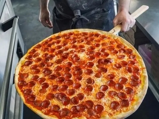 In the tradition of her immigrant great-grandfather, Cipriano Zonin, Ashley Salmon and her husband, John, use her family's recipes in their new Tampa Bay-area mobile pizzeria, which is named after him.