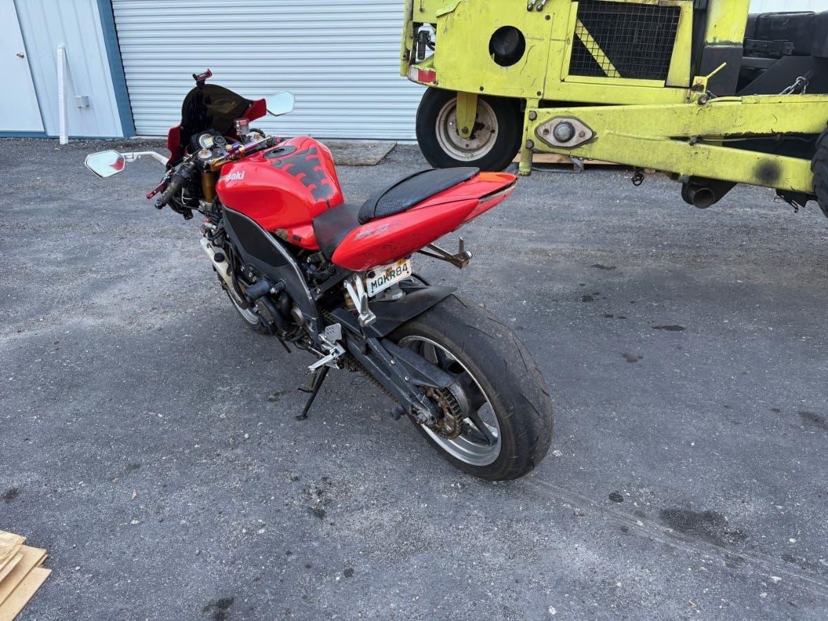 Investigators are looking for a motorcyclist who led a FL trooper on a chase in Hernando County before running into the woods. His abandoned motorcyle is pictured.