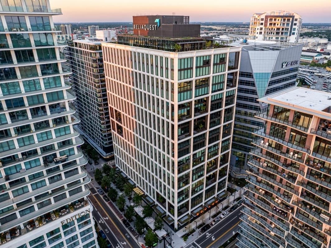A national commercial real estate firm is moving into Thousand & One, a premier office tower at Water Street Tampa, as a current tenant expands its footprint there. 