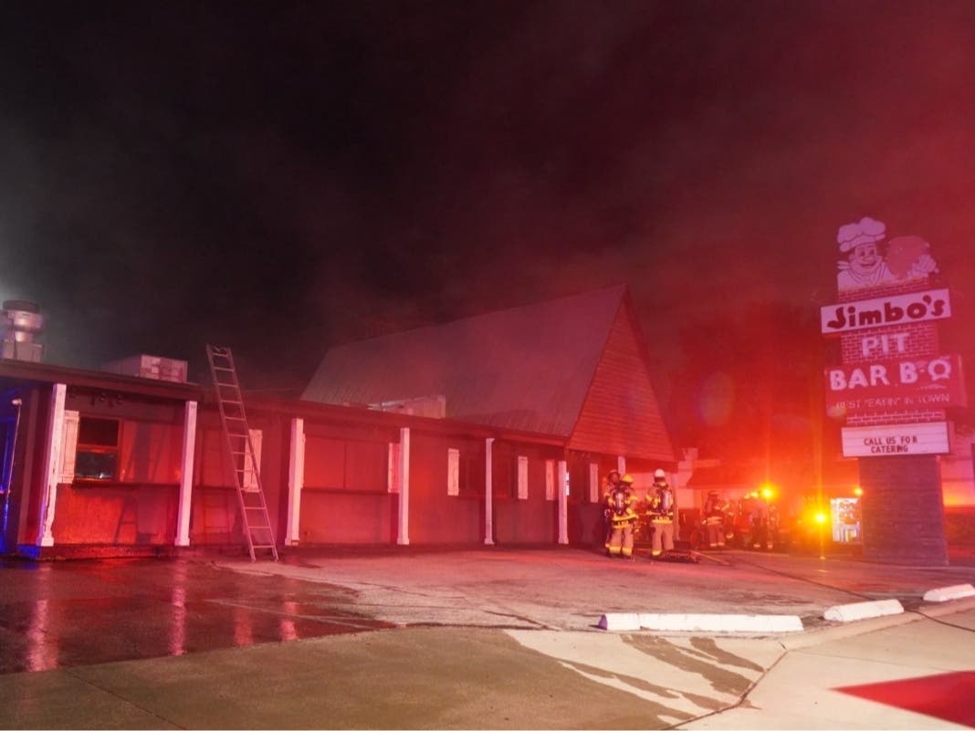 The cause of a kitchen fire at a Tampa barbecue restaurant is under investigation, fire officials said. The restaurant's owner said it will reopen after repairs. 