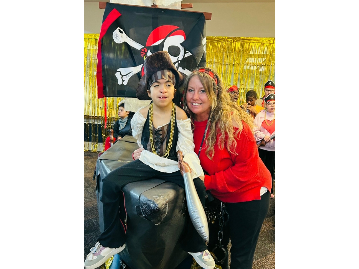 Nina Harris Exceptional Student Education Center in Pinellas Park will host its annual live auction fundraiser on Saturday. Funds will be used for specialized equipment and student events. Above, a student and staff member at a recent pirate festival.