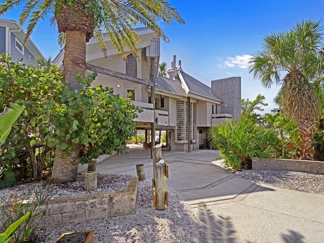 Former world No. 1 doubles tennis star Mike Bryan has listed his St. Pete Beach waterfront home for $2.6 million.