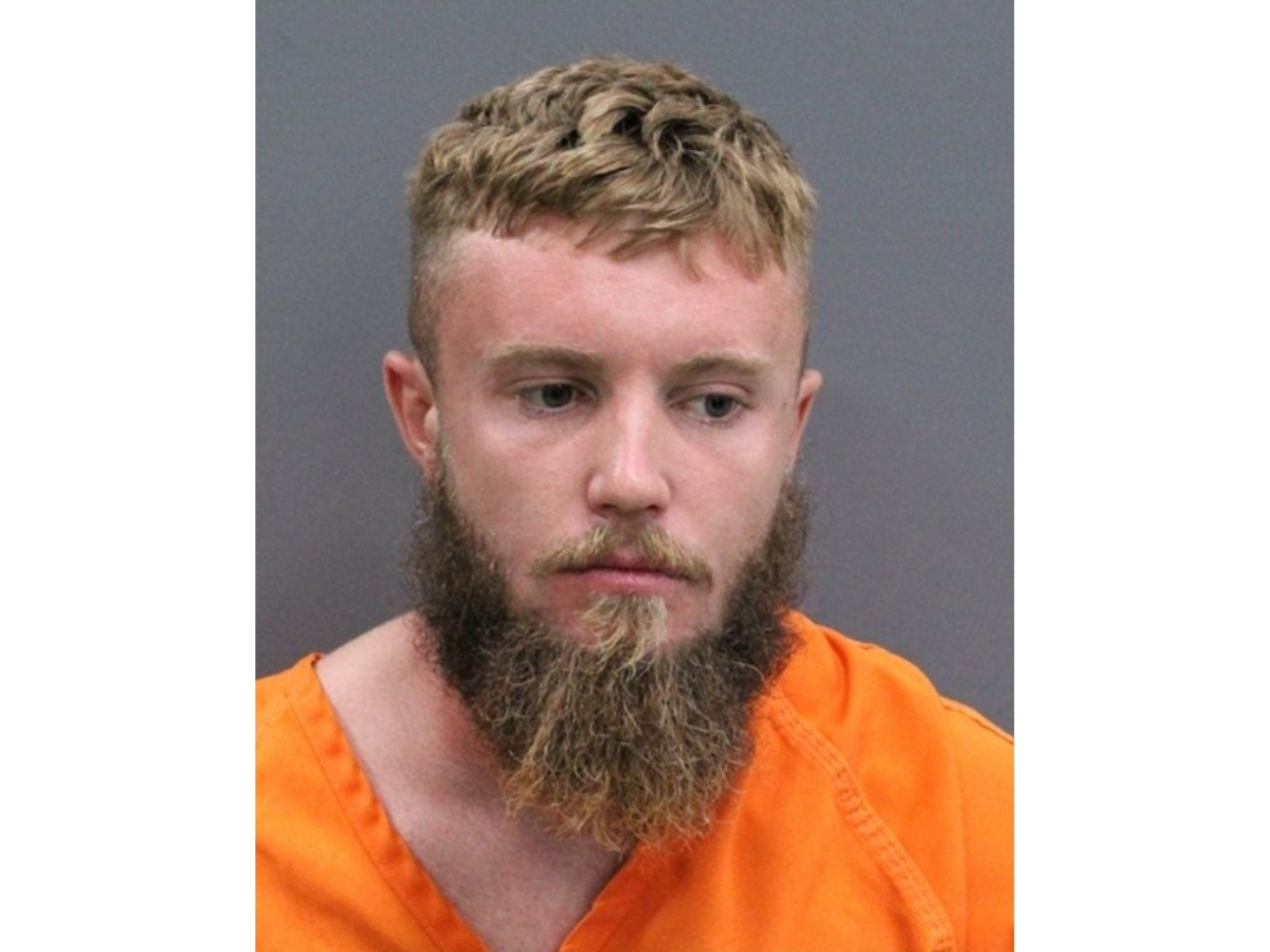 A Wimauma father was arrested for driving under the influence after being found passed out in a truck parked at a gas station with his child in the backseat, the Hillsborough County sheriff said. Two guns were also found in the truck.