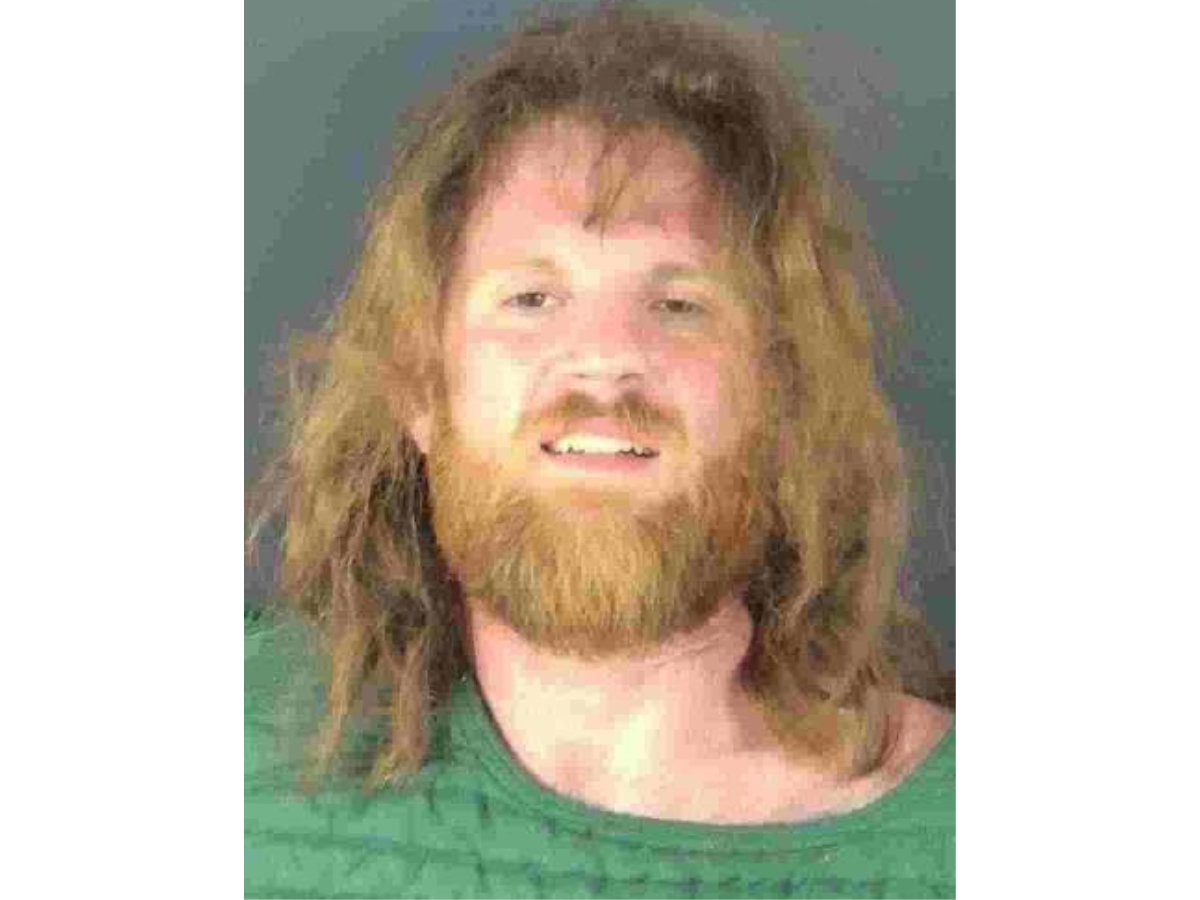 A man was charged with two murder counts and one animal cruelty count in a fatal shooting in a Sarasota neighborhood, deputies said. 