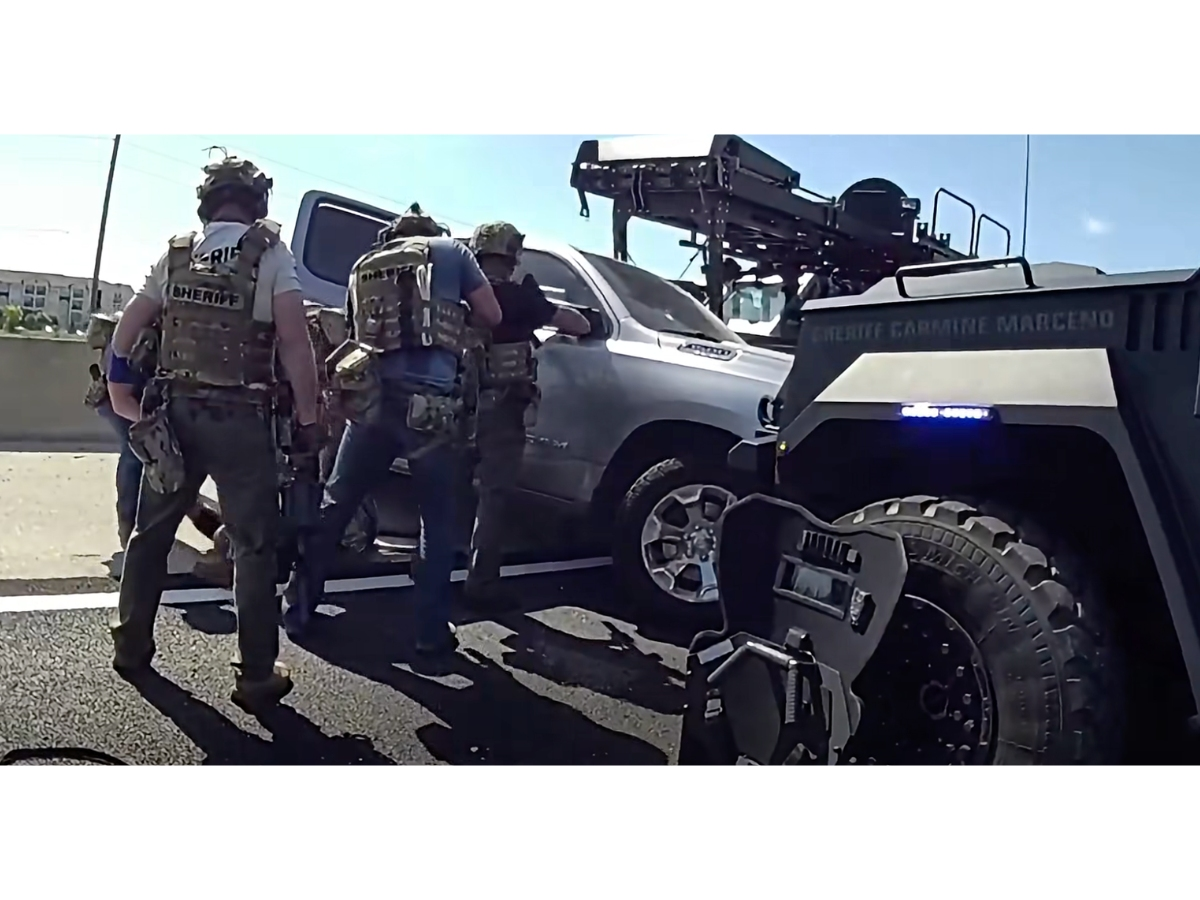 A man accused of fatally shooting a St. Petersburg sanitation worker on Wednesday remains hospitalized with serious injuries after being taken into custody on I-75 in Lee County, Florida troopers said.