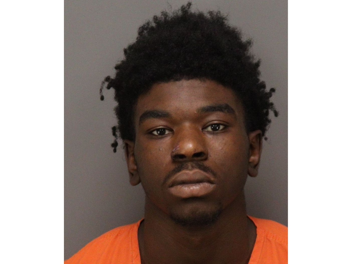 An 18-year-old died after being shot during a gun sale at the Childs Park YMCA bathroom, St. Pete police said. Another 18-year-old (pictured) was charged with attempted murder, while a second suspect remains at large.
