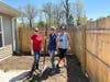 Dow credit union staff members Keshia Begley, Denise Urbaniak and Natasha Brandt pose for a photo at a Midland County Habitat for Humanity Women's Build.