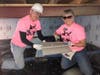Dow Credit Union CEO Michael Goad and Lisa Gray, director of risk and regulatory affairs, participate in a Women's Build.