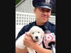 Newton Police Department’s new puppy with his handler Community Resource Officer Justin Lau.