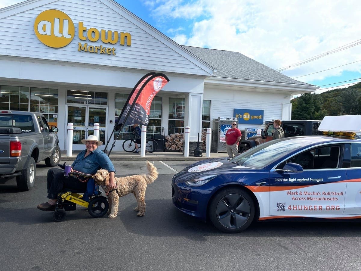 Mark & Mocha's Roll/Stroll to Combat Hunger began on Sept. 18 when Mark Roberts of Stow, Massachusetts headed out in his electric wheelchair with his labradoodle Mocha to roll across the state to raise awareness and funds to combat hunger.
