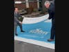 Bridgeport Mayor Joe Ganim (left) and Hartford HealthCare Fairfield Region President Bill Jennings unveil the freshly painted blue Bank Street.