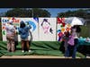 Volunteers assisted artist Amrisa Niranjan with painting the community mural.