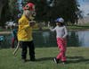 Captain Cal from Cal Fire greeting a young angler. 