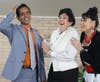 From Left, Lashman Koka and Linda Greilich and Valerie Vandever up to mischief during a scene from “Murder at the Mixer.”