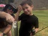 One of the twins catches his first fish!