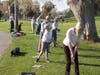 Learning the skill of putting.