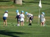 The very young learn golf at an early age.
