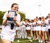 Grace Fitzgerald accepts her Essex County Tournament championship plaque