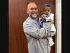 Neonatologist Dr. Mario Sanchez enjoys a visit with Nyla Brooke Haywood, a year after she left Silver Cross Hospital’s NICU. 