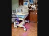Nyla checks out the state-of-the-art bassinette where she slept and was cared for by Silver Cross Hospital’s NICU team.