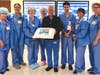 Dr. Reza Gamagami, an independent general surgeon on the medical staff of Silver Cross Hospital, celebrates his 6,000th robotic-assisted surgery case with operating room staff. The milestone places him among the top 1% of robotic surgeons globally.
