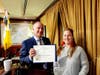 President Brett McMullen presented  a Certificate of Appreciation to Monica Drake. (Image Credit Harry Fuller)