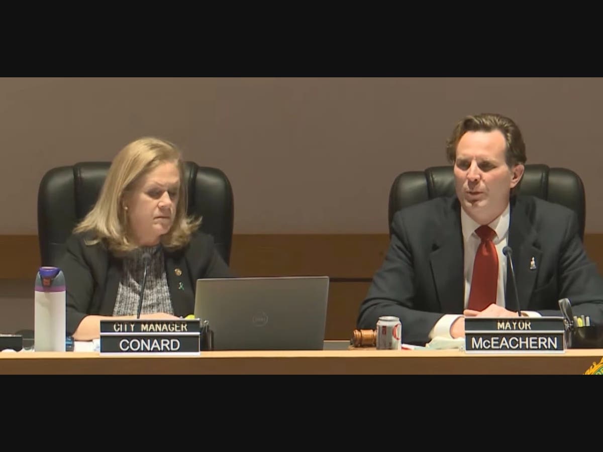 Portsmouth City Manager Karen Conard listens as Mayor Deaglan McEachern explains why the council won't vote on hiring new City Clerk Sally Kellar.