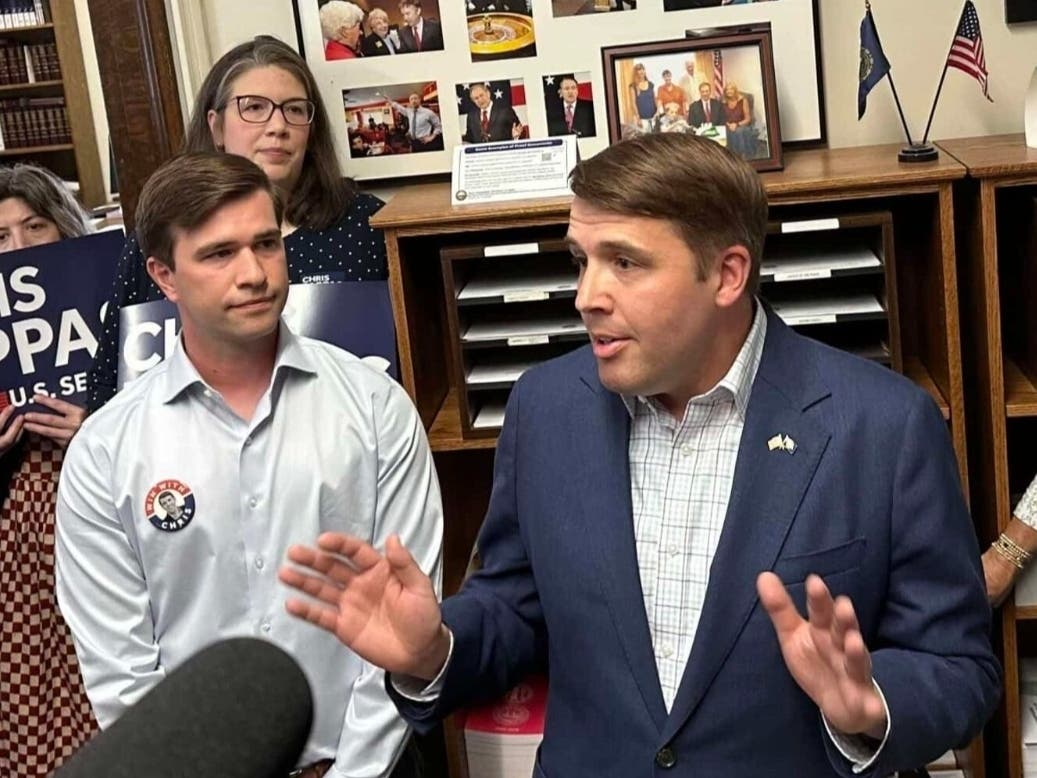 U.S. Rep. Chris Pappas is joined by his husband Vann as he files to run for U.S. Senate at the NH Secretary of State's office.