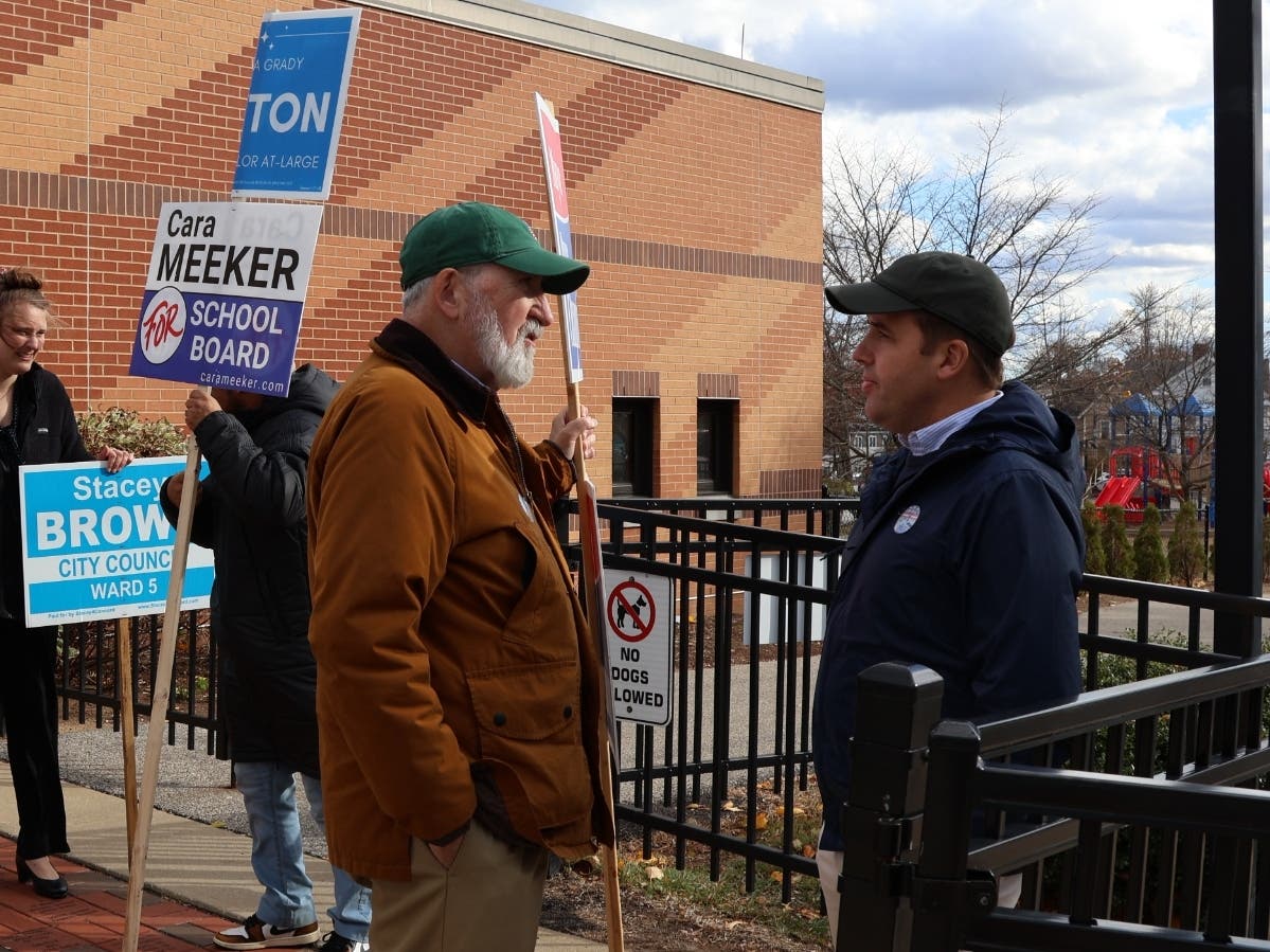 U.S. Rep. Chris Pappas, right, speaks with Concord Mayor Byron Champlin in this file photo.