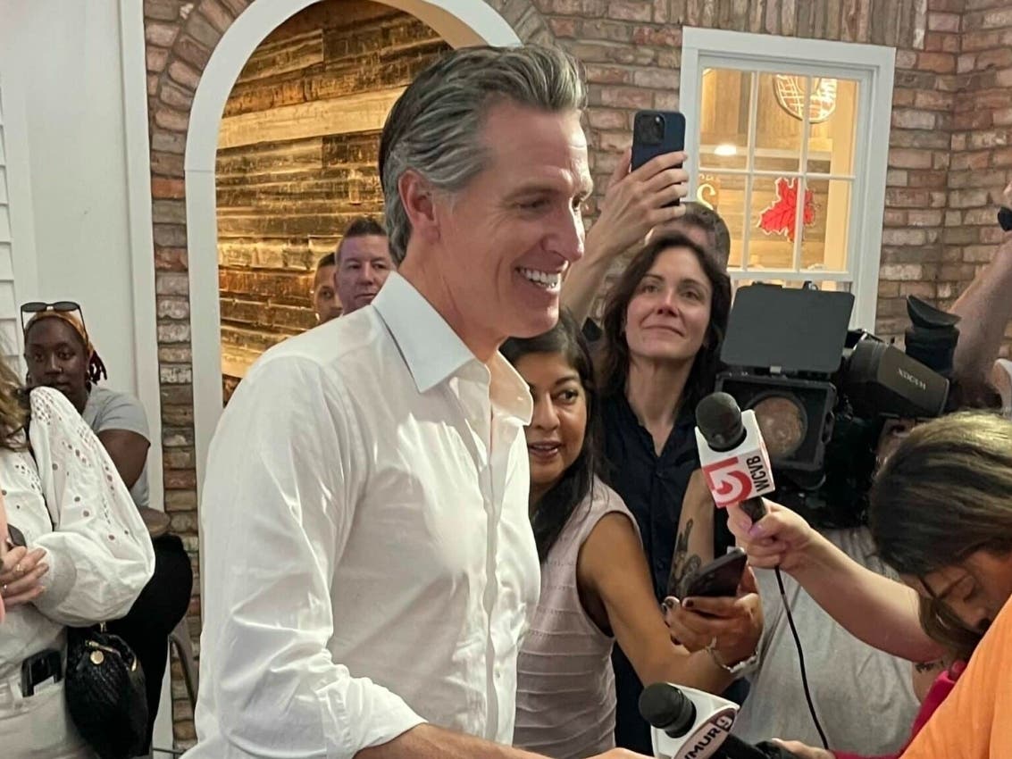 Gov. Gavin Newsom (D-Calif) campaigns for President Joe Biden at a Hooksett, N.H. rest stop on July 8, 2024.