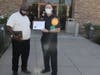 NAACP Branch 1034 President Pastor Willie J. Oliver presents a certificate and plaque of appreciation to retired Murrieta Chief of Police Sean Hadden.