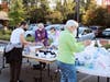Members of the San Ramon Valley United Methodist Church and The Church of Jesus Christ of Latter-day Saints, Danville, make hygiene kits together.