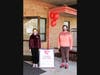 SRVUMC Senior Pastor Kim Risedorph (left)
and HollyAnn Melton (right) demonstrate social distancing observed throughout the
blood drive event.