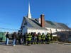 Firefighters who battled the blaze at Good Shepherd Lutheran Church attended Sunday worship.