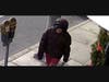 Video surveillance shows the female wearing a dark colored hoodie.
