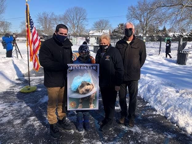 Nassau County Legis. John Ferretti, his son, Johnny, Legis. Rose Walker, and Long Island Society of Prevention of Cruelty to Animals President Gary Rodgers gathered at Eisenhower Park in East Meadow on Monday to mark the introduction of Benny’s law.
