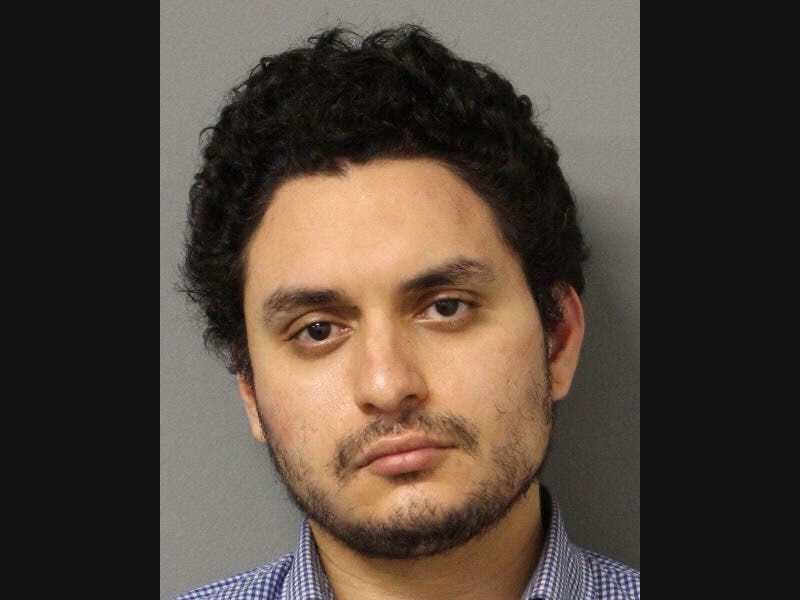 Michael Molina, 30, of Great Neck was charged with second-degree assault after injuring a police officer outside a Glen Head home, police said.