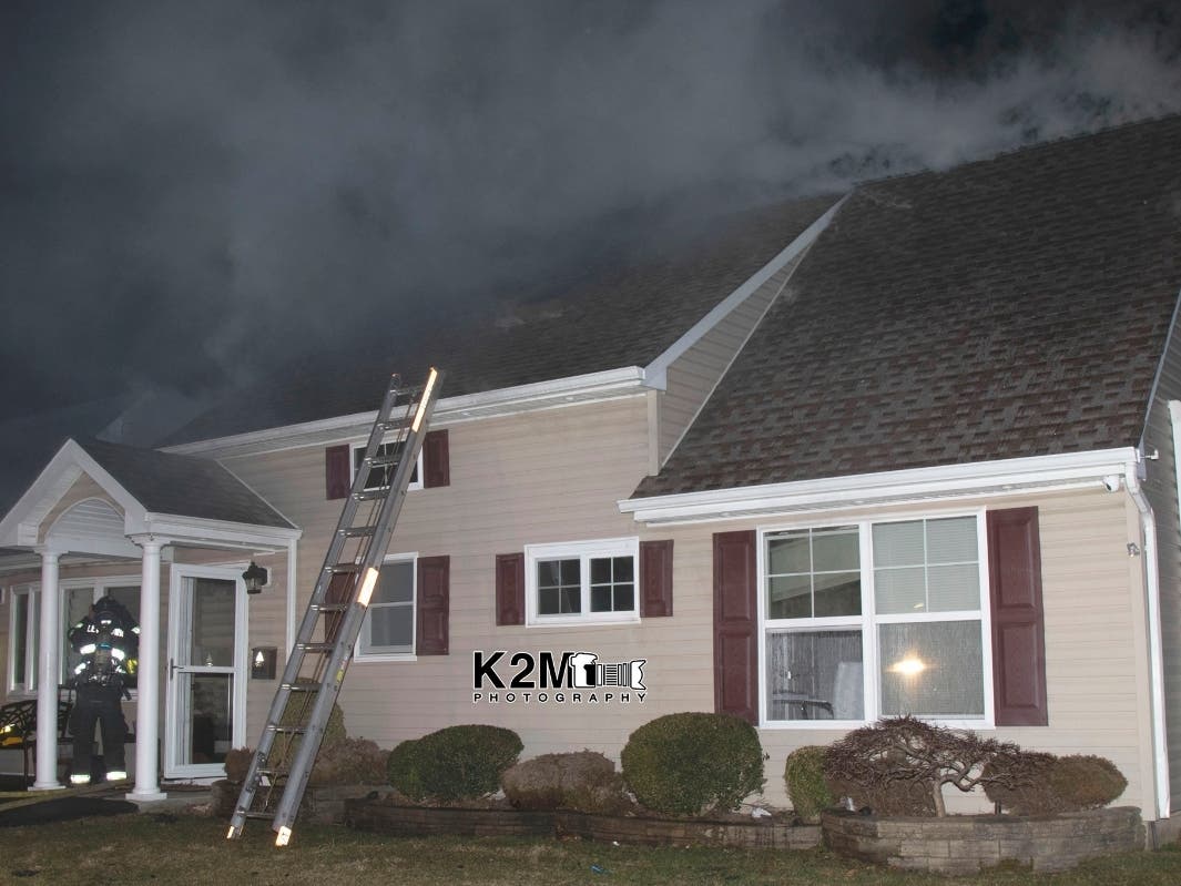 Area firefighters stamped out a fire at a two-story home on Long Lane in Levittown on Tuesday, Nassau County police said.