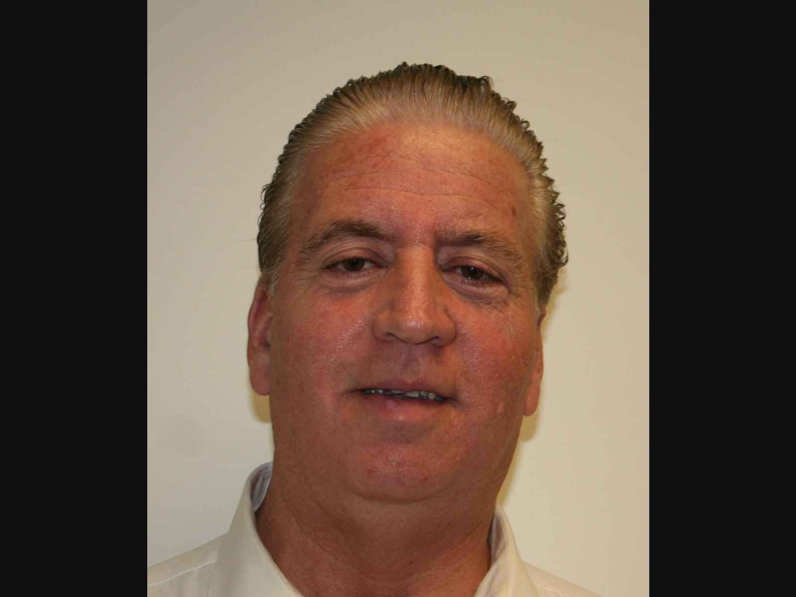 Alfred DiGirolomo, 65, of Manhasset. He was sentenced to up to four years in prison.