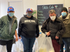 Jordan Lerner, Nicole Santomauro, Matthew Knowles, and David Ruiz, of the Family Residences and Essential Enterprises POD food delivery service program, get ready for day at work.