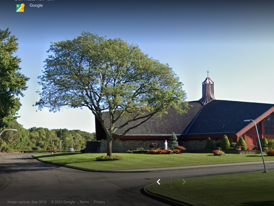 A plaque of a priest accused of clergy abuse has been covered up outside of St. Paul the Apostle in Old Brookville, according to a report in Newsday.