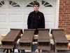 Jesse Ryan with over a dozen finished bat boxes for outside of North Hempstead’s Animal Shelter in Port Washington.
