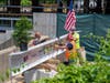 A construction crew preparing the beam.
