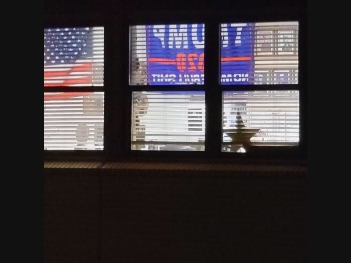 An American flag and a “Trump 2020” banner on display at a Levittown Fire Department station in Bethpage.